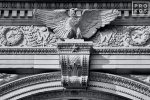 A black and white architectural detail photo of the arch at Washington Square Park, in New York's Greenwich Village