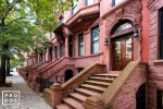 A fine art architectural photo of classic brownstones in the Mt. Morris section of Harlem, New York City