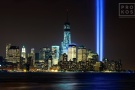 A view of Lower Manhattan, the World Trade Center and Towers of Light at night