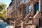 A fine art architectural photo of a row of brownstones along Hudson Street in Hoboken, New Jersey