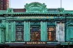 A panoramic format architectural photo of the ornate facade of Hoboken Terminal, New Jersey