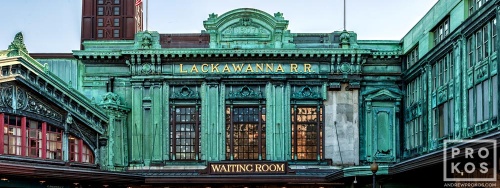 A panoramic format architectural photo of the ornate facade of Hoboken Terminal, New Jersey
