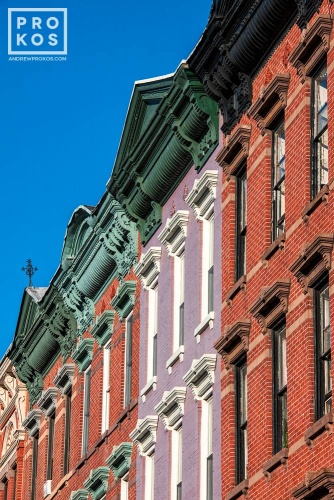 A row of tenement building facades along Washington Street in Hoboken, New Jersey
