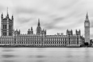 A sweeping black and white panoramic view of the Houses of Parliament, Big Ben, and the Thames River in London, United Kingdom. Composed of multiple 2-4 minute long-exposure images seamlessly merged to create an ultra high-definition image. Large-format fine art prints of this photo are available up to 150 inches in width.