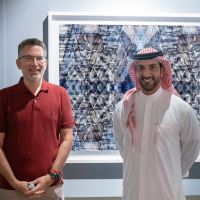 Andrew Prokos and Sheikh Sultan al Qasimi at Metropolis Abstracted Photography Exhibition Photographer Andrew Prokos with His Highness Sheikh Sultan bin Ahmed Al Qasimi at a viewing of his photography exhibition 'Metropolis Abstracted', Sharjah, UAE 2022