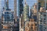An abstract photograph capturing the urban reflections of Manhattan West on the facade of a tower in Hudson Yards, NYC. High-definition limited edition prints of this photo are available up to 120 inches in height and framed in wood, metal and acrylic styles.