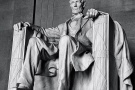 A black and white fine art photo of the colossal seated statue of Abraham Lincoln found inside the Lincoln Memorial in Washington DC