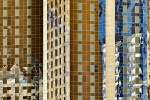 Vivid color reflections on a glass architectural facade in Dubai, from Andrew's series "Inverted". Framed limited edition prints of this photo are available up to 72 inches in height.