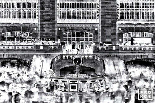 A view of the interior of Grand Central Terminal in New York at rush hour shot with long-exposure time. From the fine art photography series "Inverted" by photographer Andrew Prokos