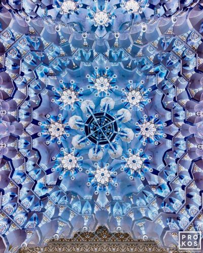A chandelier and ornate Islamic style coffered ceiling from the Qasr al Watan in Abu Dhabi. From the conceptual fine art photography series Inverted by photographer Andrew Prokos