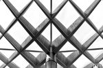 An architectural detail from the glass and steel canopy by Foster + Partners at Kogod Courtyard, located between the National Portrait Gallery and the Smithsonian Museum of American Art, Washington DC. Framed fine art prints of this photo are available up to 80 inches in width