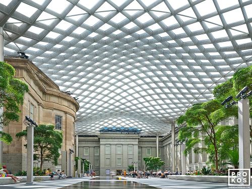 An architectural interior photo of Kogod Courtyard, with its undulating glass and steel canopy in the National Portrait Gallery, Washington DC