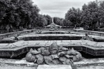 A black and white landscape photo of the fountains in the gardens of the Royal Palace at La Granja de San Ildefonso, Spain