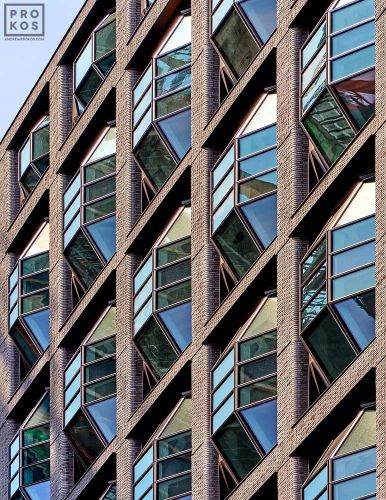 A close-up view of the Lantern House building facade in the High Line neighborhood of Manhattan, with its unique design of emergent bay windows. Limited edition prints of this photo are available up to 80 inches in height.