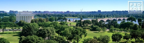 A panoramic landscape photo of the National Mall, Lincoln Memorial and Arlington Memorial Bridge in Washington DC.