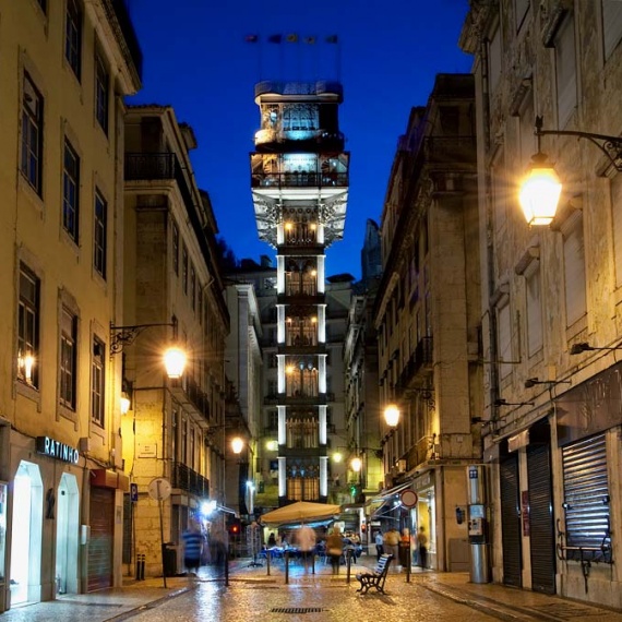 A night street scene of the Santa Justa elevator in Lisbon, Portugal. Framed fine art prints of this photo are available up to 50 inches.