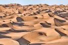 A panoramic landscape photo of the dunes of Liwa Desert in Abu Dhabi, United Arab Emirates. High-definition limited edition prints available up to 150 inches wide.