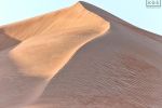 A large-scale fine art photograph of a high dune from the Liwa desert in the Arabian peninsula, Abu Dhabi, UAE. Large-format prints of this photo are available up to 72 inches.