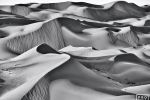 A high-resolution landscape of the dunes of Liwa Desert, Abu Dhabi, United Arab Emirates. Large-format black and white prints of this photo are available up to 90 inches in width.