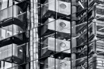 Abstract photography of reflections on a black glass facade in the City of London in black and white. Large-format limited edition prints of this photo are available up to 72 inches in width and framed in contemporary styles. 