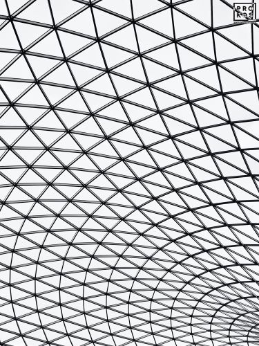 A black and white architectural detail of the mesh canopy covering the British Museum's Great Court in London, United Kingdom. Limited edition prints of this photo are available up to 72 inches in height.