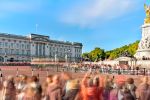A long-exposure view of Buckingham Palace thronged with spectators watching the procession of the King's Life Guard in London, England, United Kingdom.