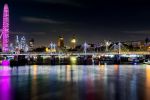 An ultra high-definition skyline of the London Eye, Jubilee Bridge and reflections of city lights on the Thames River at night, London, United Kingdom. Large-format fine art prints of this photo are available up to 200 inches in width and framed in acrylic and metal styles.