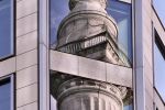 A reflection of the Monument to the Great Fire of London on an adjacent office tower facade, London, United Kingdom. Fine art prints of this photo are available up to 72 inches in height and framed in various wood, metal and acrylic styles.