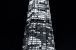A black and white vertical panoramic photo of London's Shard captured at night by photographer Andrew Prokos. High-definition fine art prints of this photo are available up to 96 inches in height and framed in various wood, metal, and acrylic styles.