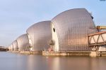 Long-exposure fine art photography of the Thames Barrier in London, United Kingdom. Captured with an eight-minute exposure time, the flowing river and sky are rendered with a soft ethereal quality. Large-format fine art prints of this photo are available up to 72 inches in width.