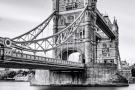 A view of Tower Bridge in black and white, captured with an eight-minute-long exposure. The long exposure time blurs the sky and water, creating a soft, ethereal rendition of London's iconic bridge. Large-format fine art prints of this photo are available up to 80 inches in height
