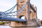 A view of Tower Bridge during the day, captured with an eight-minute-long exposure time. The long exposure time blurs the sky and water, creating a soft, ethereal rendition of London's iconic bridge. Large-format fine art prints of this photo are available up to 80 inches in height