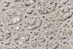 An high-definition photo of the intricate geometric patterns from the interior of the dome in the Louvre Abu Dhabi Museum by architect Jean Nouvel, United Arab Emirates.