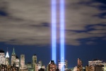 Skyline of Lower Manhattan with the Towers of Light commemorating 9/11. Fine art prints of this photo are available framed in various styles, please inquire. 