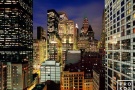 A fine art cityscape photo of Lower Manhattan skyscrapers at night, New York City