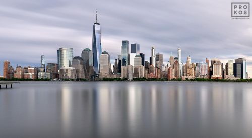 New York skyline photo of Lower Manhattan and the World Trade Center during the day. Captured with an eight minute long-exposure time by photographer Andrew Prokos