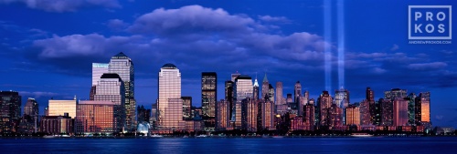 An ultra high-definition panoramic skyline of Lower Manhattan at dusk with Towers of Light commemorating 9/11. Large-format fine art prints of this photo are available up to 120 inches wide.