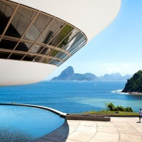 Architectural photography of the Niteroi Contemporary Art Museum (Museu de Arte Contemporanea, Niteroi) by modernist architect Oscar Niemeyer in Rio de Janeiro, Brazil. Limited edition fine art prints of this photo are available framed in various wood, metal, and acrylic styles. 