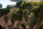 A view of the Niteroi Contemporary Art Museum (Museu de Arte Contemporanea) by architect Oscar Niemeyer as seen in situ from a distance. Fine art prints of this photo are available framed in various styles.