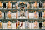 A color architectural photo of the decorative murals adorning the facade of the Panaderia in the Plaza Mayor, Madrid, Spain