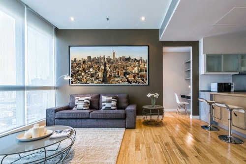 Large scale color cityscape of Manhattan by photographer Andrew Prokos in a luxury loft apartment