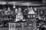 A black and white cityscape showing the skyscrapers of Midtown and Lower Manhattan at night, New York City. Limited edition prints of this photo are available up to 72" wide and framed in various styles. 