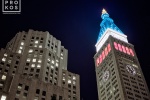 A long-exposure night photo of the MetLife Building in Manhattan lighted in red, white and blue
