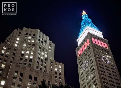 A long-exposure night photo of the MetLife Building in Manhattan lighted in red, white and blue