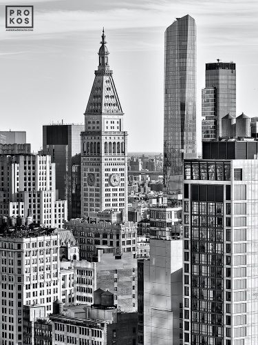 A striking cityscape capturing the historic Met Life Building in contrast to the adjacent contemporary towers of downtown Manhattan, New York City. Black and white fine art prints of this photo are available up to 72 inches in height and framed in wood, metal, and acrylic styles.