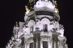 The landmark Metropolis Building at night, Madrid, Spain. Framed fine art prints of this photo are available in various sizes.