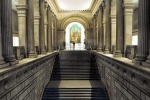 An architectural interior view of the Metropolitan Museum of Art's grand staircase leading to the European Paintings collection by photographer Andrew Prokos