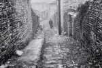A view of the stone houses and paths of Metsovo village, Epirus in black and white