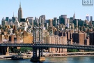 A daytime cityscape photo of Midtown Manhattan and the Manhattan Bridge