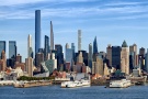 New York Skyline - A panoramic view of the Midtown Manhattan skyline as seen from Weehawken, New Jersey at during the day. Large-format prints of this photo are available up to 96 inches in width.
